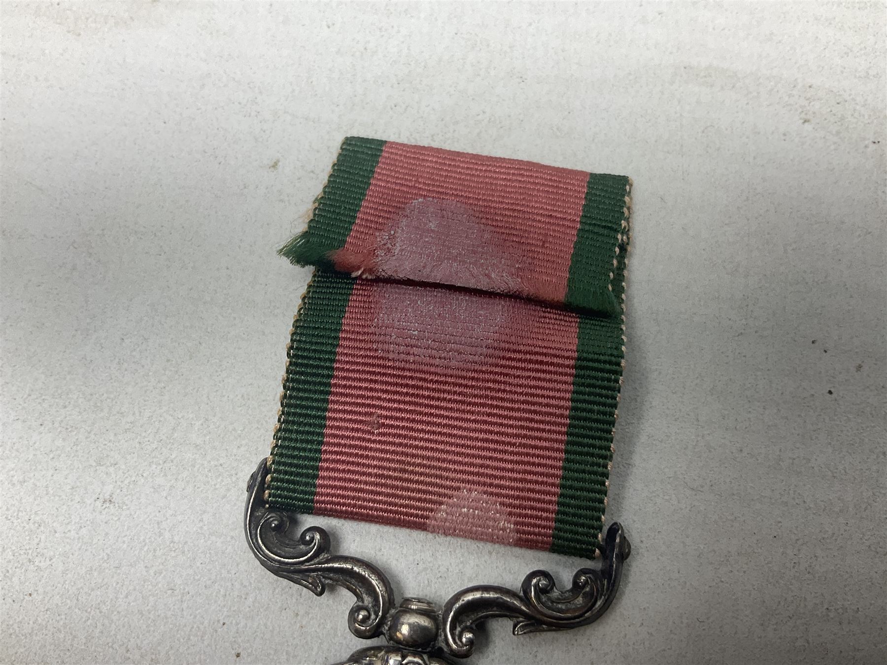 Turkish Crimea Medal 1855, unnamed, fitted with scrolling suspension bar and ribbon