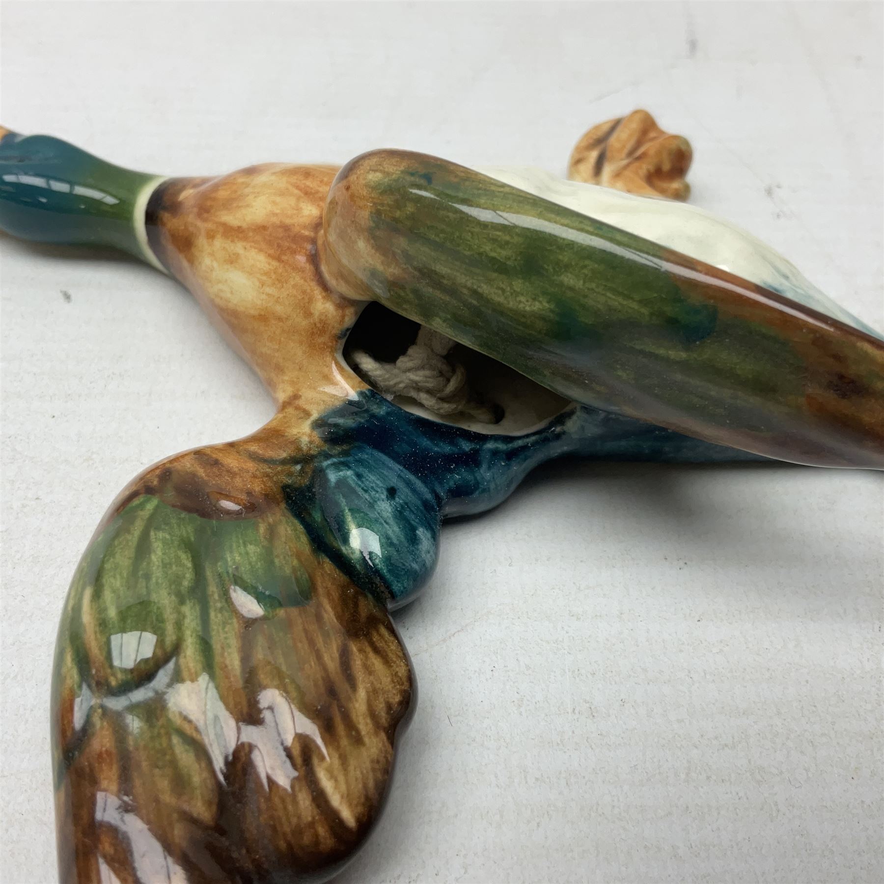 Set of five Beswick graduated wall mounting figures of flying ducks, models from 596/0 to 596/4, largest L29cm