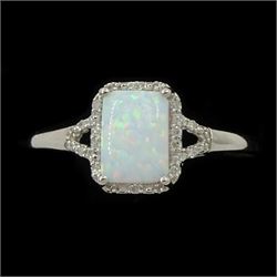 9ct white gold opal and diamond cluster ring, with diamond set shoulders, hallmarked
