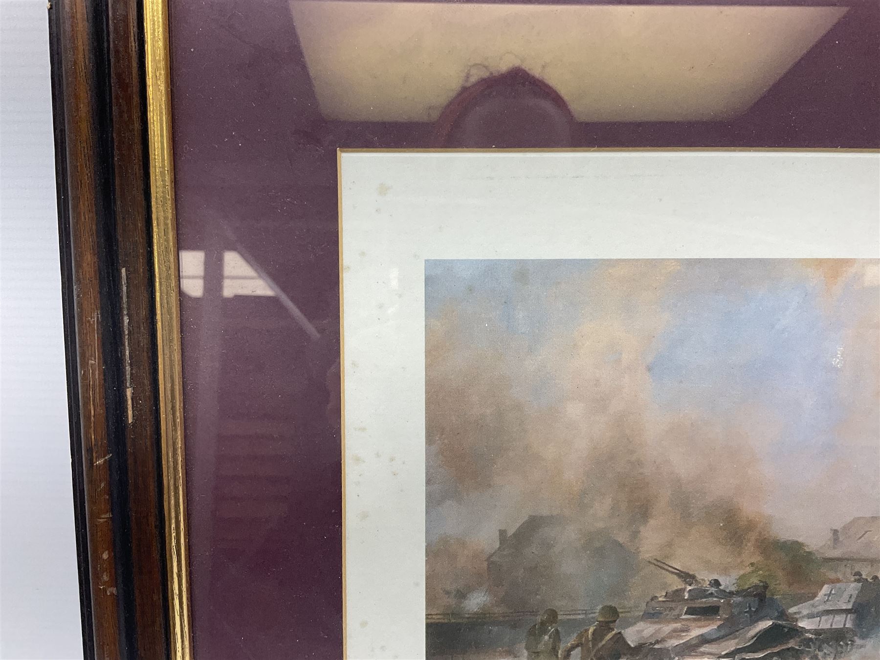 After Alan Fernley, colour print 'The Bridge at Arnhem', signed on the mount, 37 x 50cm; and after John Sellars, colour print 'Pegasus Bridge. Early Morning of D-Day 6th June 1944 Benouville Normandy'; both in mahogany stained frames (2)