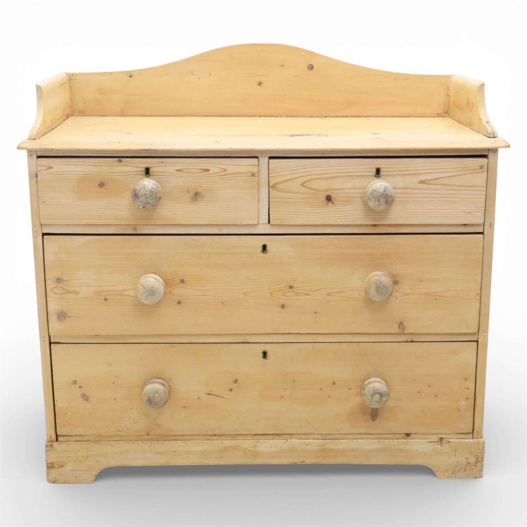 20th century pine chest of drawers, shaped galleried top, above two short over two long drawers, raised on bracket feet