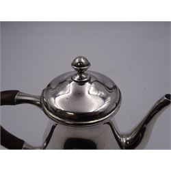 Liberty & Co 1930s small silver coffee pot, of plain baluster form, with brown Bakelite C handle with trefid mounts and cover with spherical knopped finial, upon circular stepped foot, hallmarked Liberty & Co, Birmingham 1934