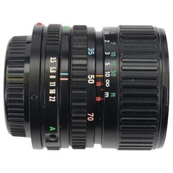 Collection of Canon camera lenses and accessories, including EF 50m 1:1.4 lens, EF 35mm 1:2 lensFD 28mm 1:2.8 lens, FD 50mm 1:1.8 lens, FD 135mm 1:2.5 S.C lens, FD35-70mm 1:3.5-4.5 lens, three Speedlite 550EX flashes, Transistor pack E, lens hoods, battery chargers, etc 