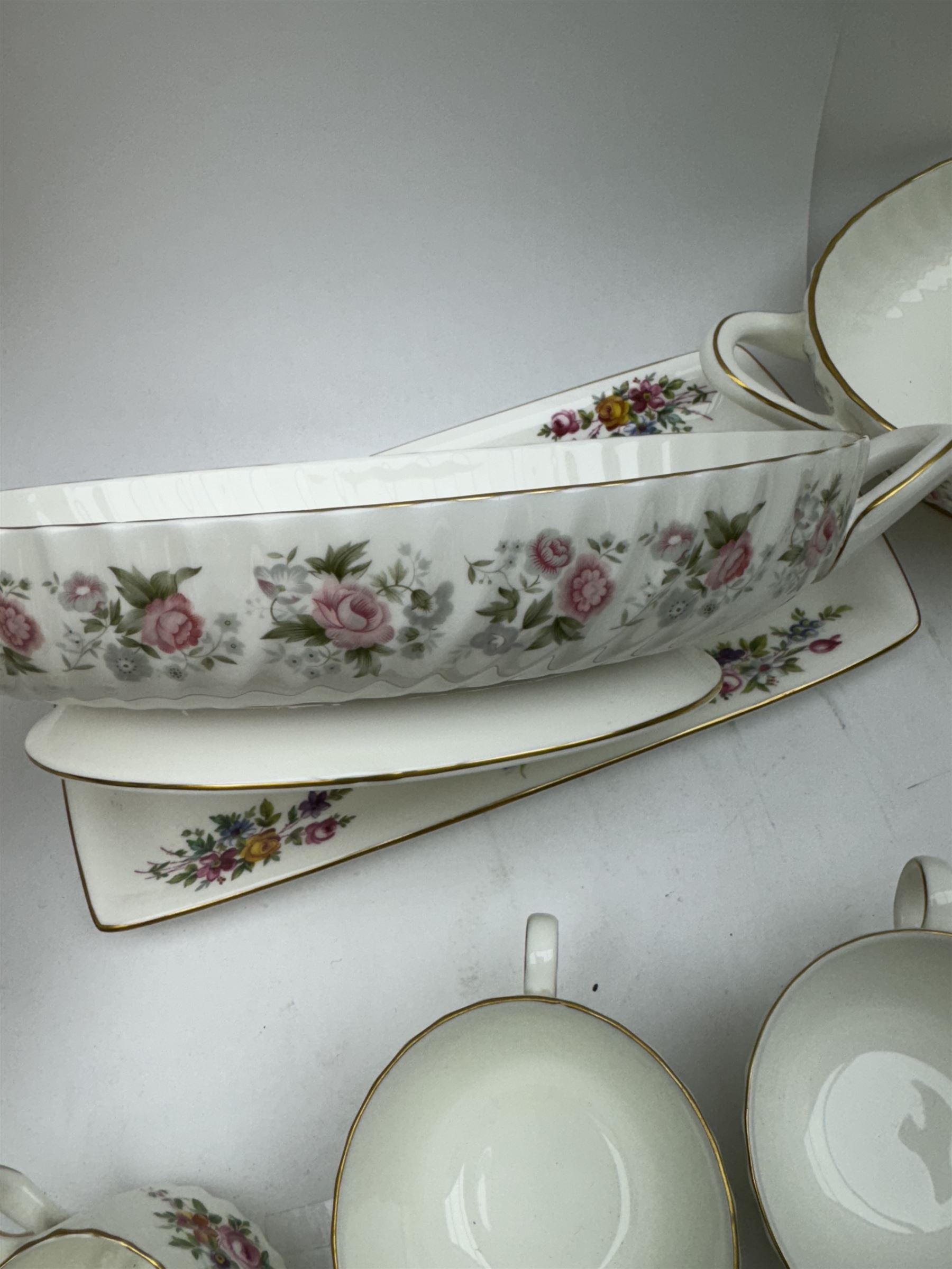 Minton Spring Bouquet pattern part tea and dinner service, including six dinner plates, six side plates, two covered dishes etc, together with Minton Marlow pattern part tea service  
