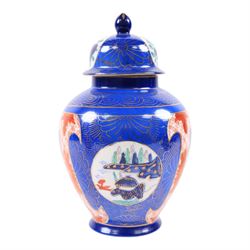 Three Chinese vases and covers, each decorated with floral sprigs, H24cm 