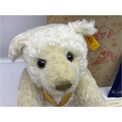 Modern Steiff teddy bear - The Millenium Bear No.34709 with golden pendant H32cm; in original box with paperwork; together with a Steiff ball-point pen in case sent to the vendor as compensation for a delay in receiving the bear.