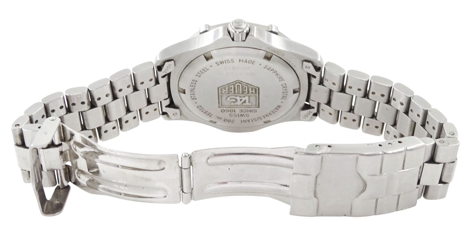 Tag Heuer gentleman's stainless steel quartz wristwatch, Ref. WK1112-0, silvered dial with baton hour markers and date aperture, on original stainless steel bracelet, with fold-over clasp