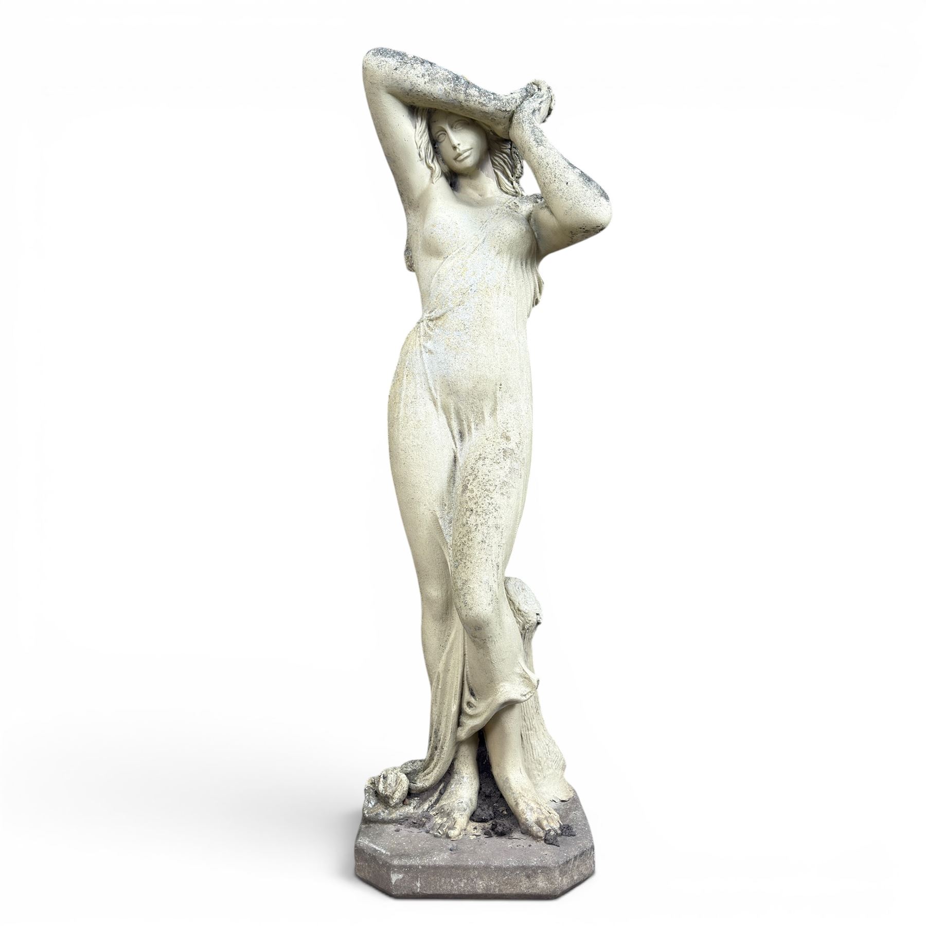 Composite stone garden figure of a scantily clad lady