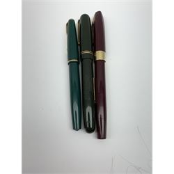 A Swab Mabie Todd & Co Ltd self filler fountain pen, with gold coloured clip and banding, and nib marked 14ct, together with a Sheaffer example, with burgundy body and nib marked 14K, and a Parker 17 Lady fountain pen with green body, with unassociated case. 