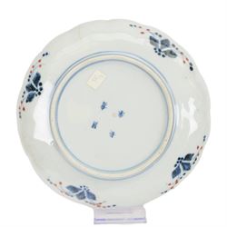 Group of 19th century Japanese Imari porcelain, Meiji period, comprising pair of lobed dishes, decorated stylised reserves and painels in blue and gilt upon a red ground, H6.5cm D21.5cm, a pair of plates of circular lobed form, decorated with a central panel depicting a vase beneath pine branches, and surrounded by panels of flowers and stylised quatrefoil shapes, D21cm, and another similar example painted with a character in underglaze blue to the centre, with character mark beneath, D22cm, each with character marks beneath               