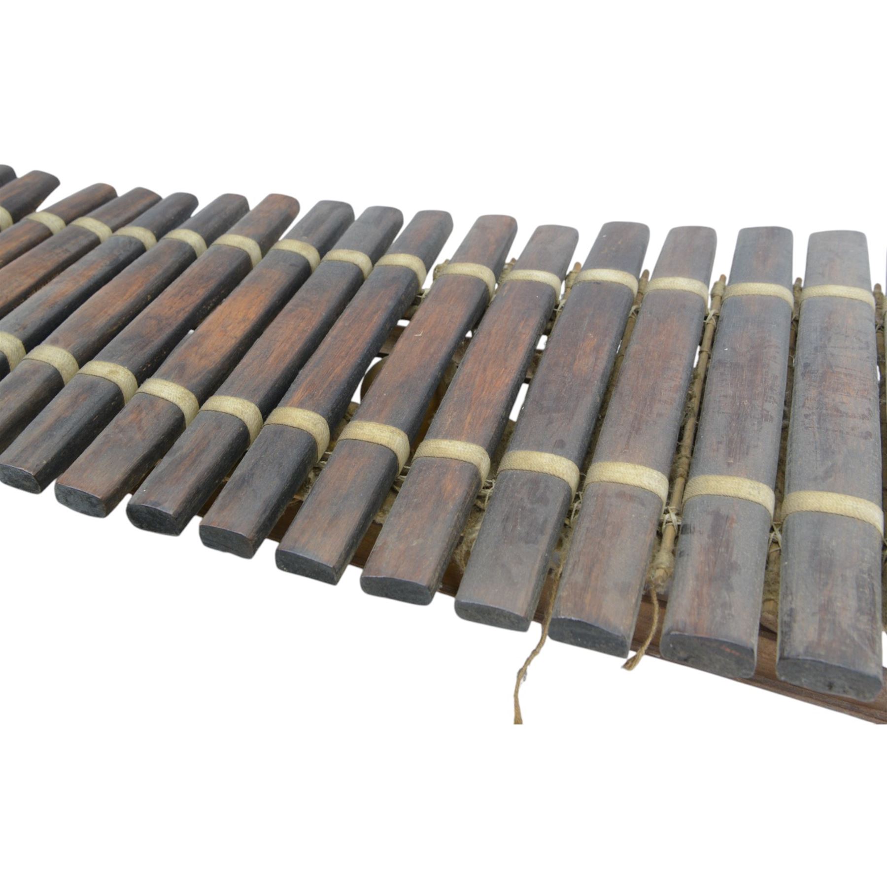 West African gourd-resonated balafon, with twenty hardwood tone bars and four beaters, L112cm