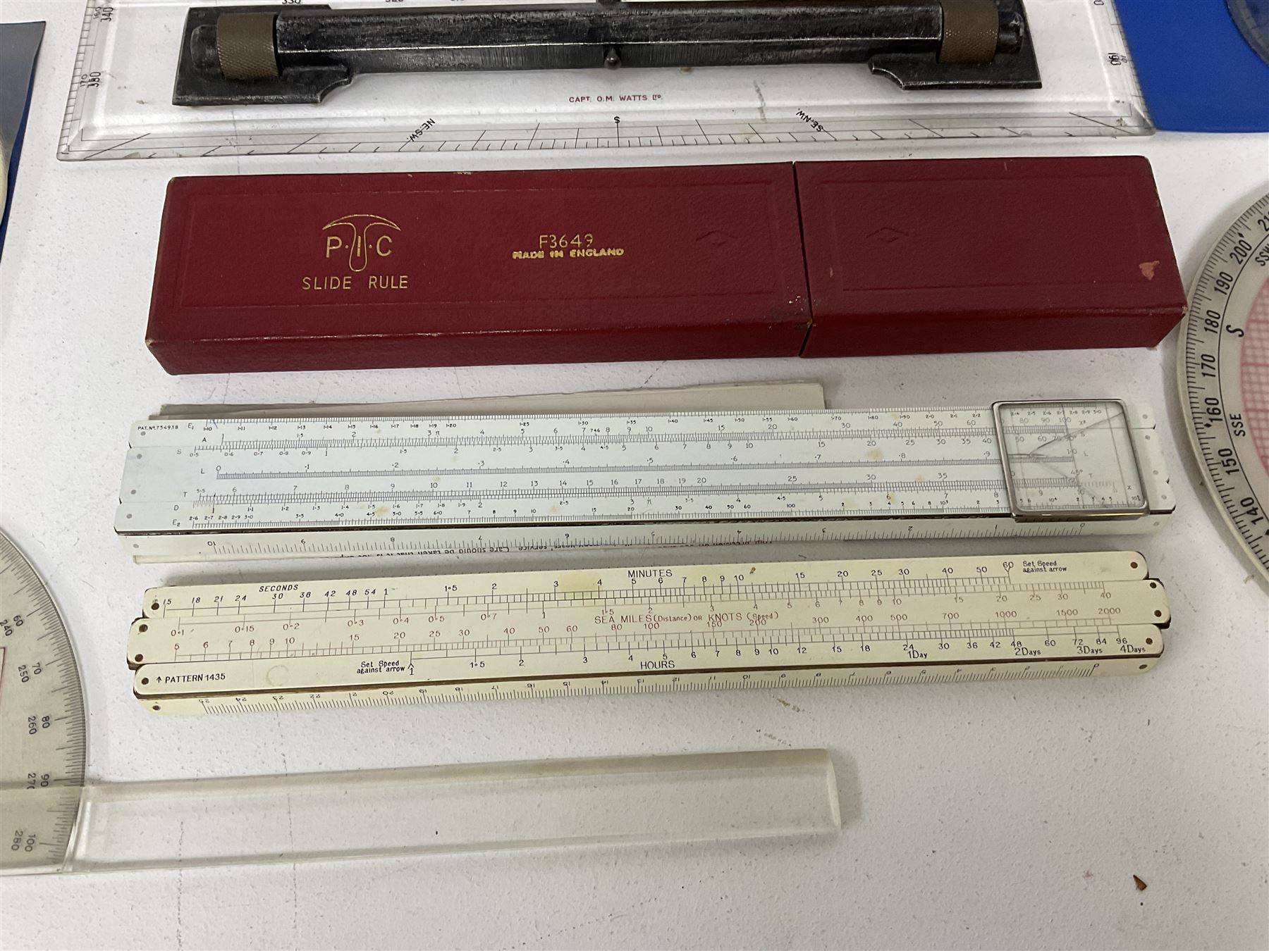 Brass 360 precision drafting protractor by Chadburn bros, in mahogany case, A G Thornton Drawing instruments in a mahogany case, together with P.I.C slide ruler, Nautical protractors etc 