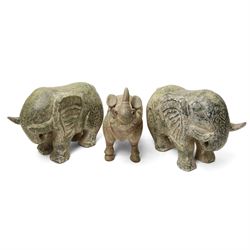Carved stone Rhino, W44cm and a pair of two green stone Elephants, W38cm (3)