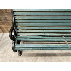 Early 20th century slatted garden bench with scrolling cast iron bench ends