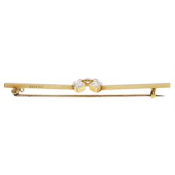 Early 20th century gold old cut diamond horseshoe brooch, stamped 15ct Plat, total diamond weight approx 1.05 carat, in velvet and ilk lined box
