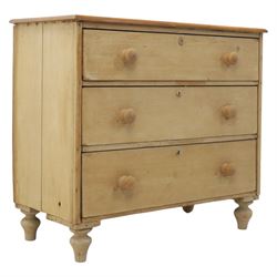 Victorian stripped pine chest, fitted with three drawers, turned wooden handles, raised on...