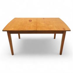 Mid-century Dutch teak extending dining table, rectangular top with lightly chamfered edge incorporating a pull-out extension leaf stowed on the underside, above a plain apron and raised on four square tapering chamfered legs, unextended length 140cm