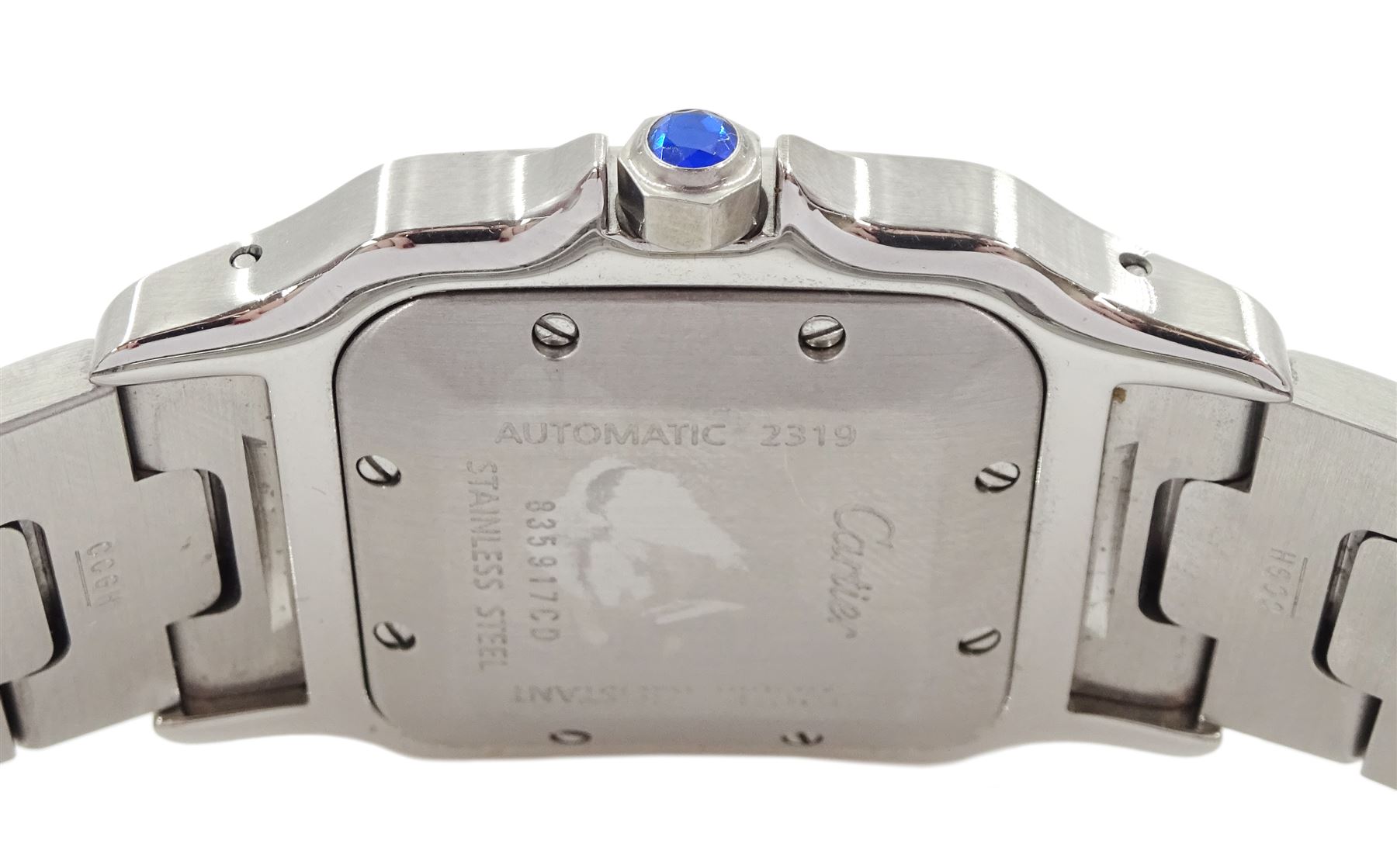 Cartier Santos Galbée gentleman's stainless steel automatic wristwatch, Ref. 2319, silvered guilloche dial with Roman numerals and secret signature at 7 o'clock, boxed purchase certificate dated 2003, pouch and service receipt dated September 2023