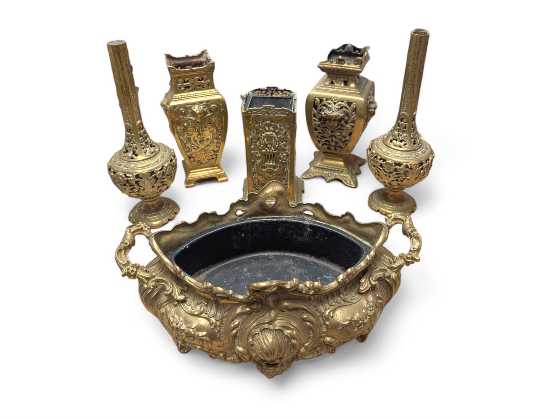 Brass twin handled planter, pair of pierced brass bottle neck vases and three other brass vases