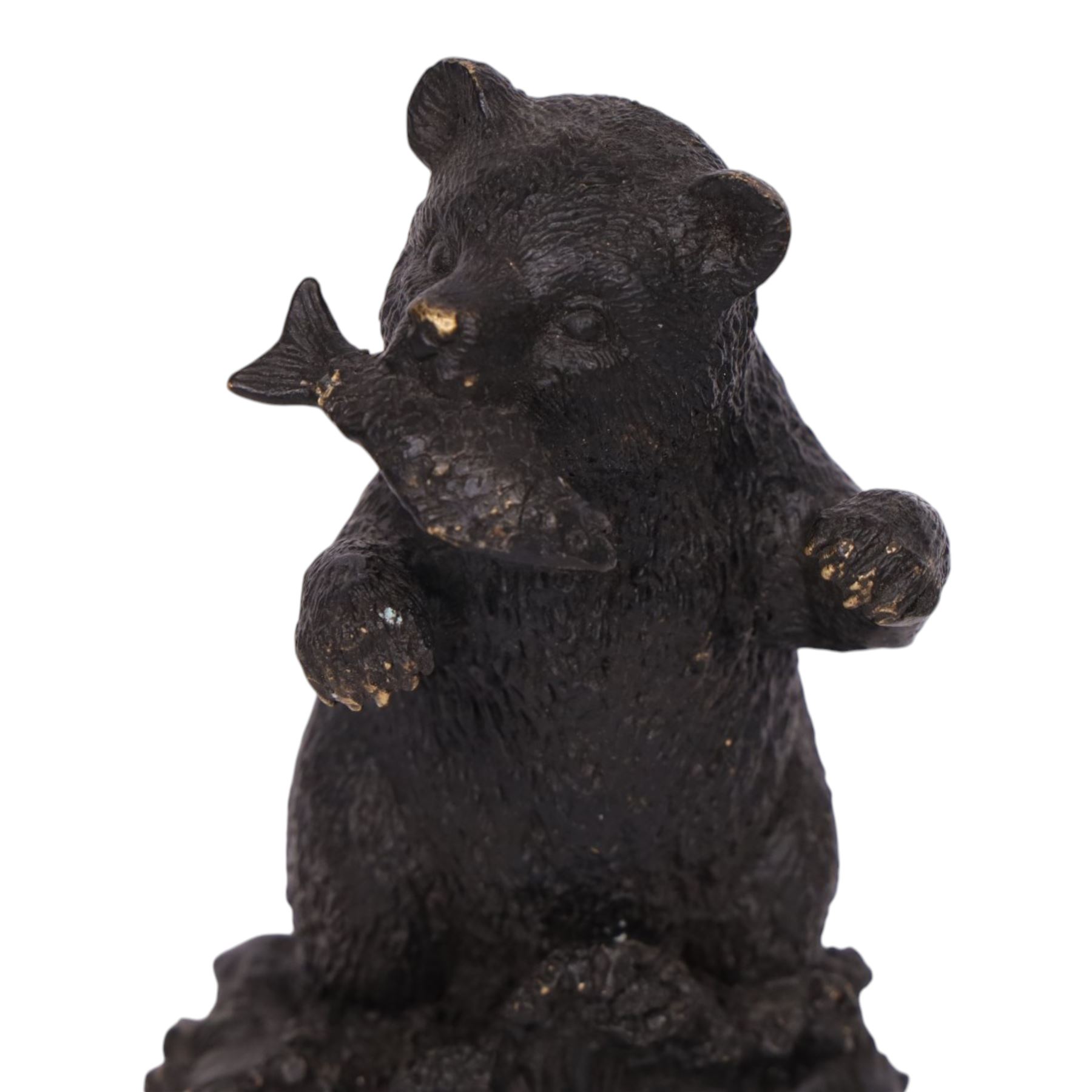 Bronze bear, upon a naturalistic base, with a fish in mouth, H17cm