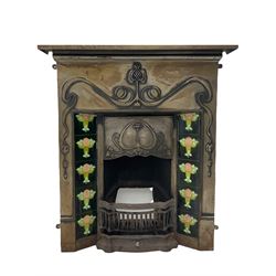 Art Nouveau style iron fireplace, cast floral detail, inset ceramic tiles