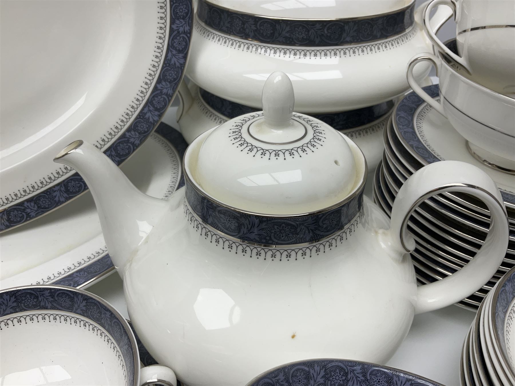 Royal Doulton Sherbrooke pattern part dinner and tea service, to include teapot, ten twin handled soup bowls and saucers, two serving platters, three twin handled covered dishes etc (63)  