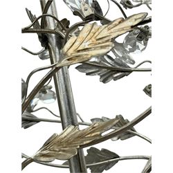 India Jane - silver finish metal chandelier, modelled with scrolling vines and leaves, embellished with faceted glass drops, fitted with six candle sconces, and wired for electricity