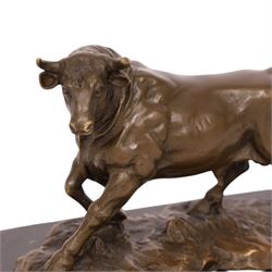 After Antoine-Louis Barye: bull upon naturalistic base, bronze, signed A Barye and bearing foundry mark, upon rectangular black stone plinth, overall H14cm L21cm