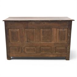 George III oak dresser base, rectangular top with moulded edge, three fielded panelled drawers with brass swan neck handles, over four fielded panelled front with the central two cupboard doors, raised on stile supports