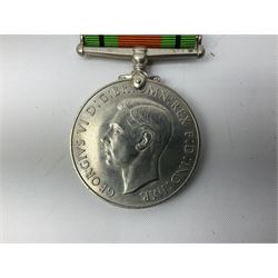 WW2 War Medal 1939-45 and Defence Medal with slip in un-named issue box.