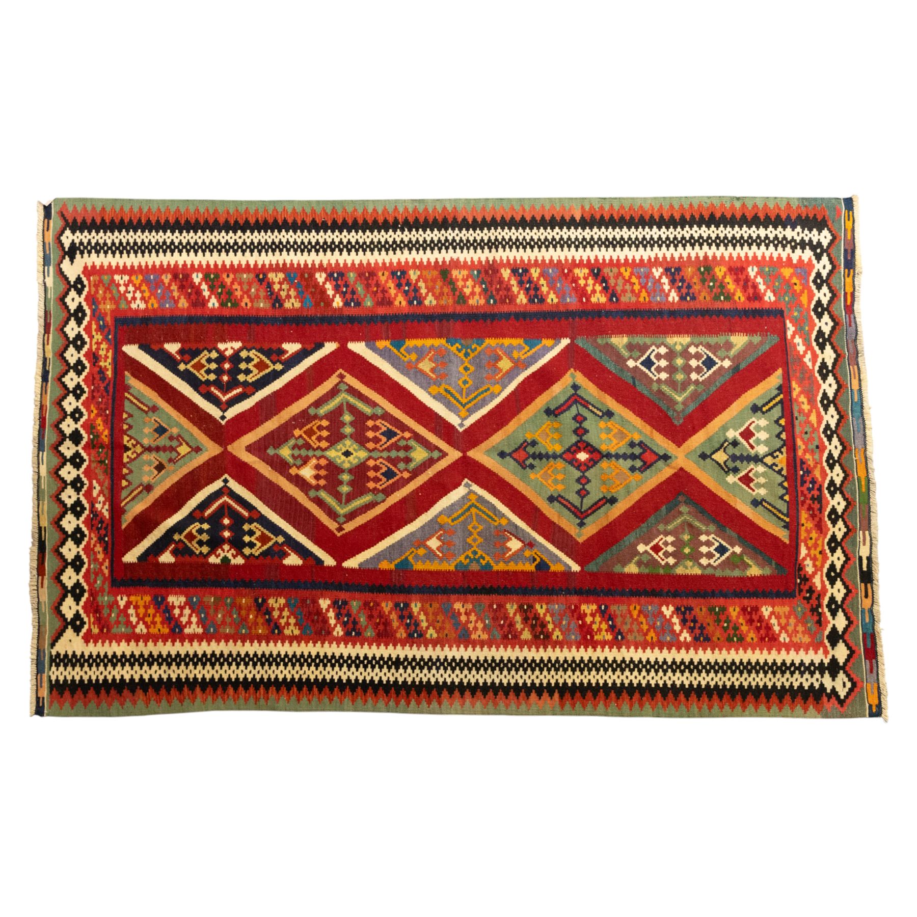 South West Persian Qashqai flatweave kilim, madder red ground with stacked diamond panels filled with latch hook and angular floral motifs, enclosed by multiple geometric borders in palettes of indigo, green, and ochre 