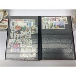 Mostly Queen Elizabeth II Great Britain and Isle of Man stamps including mint examples, housed in various albums, stockbooks and loose, in one box