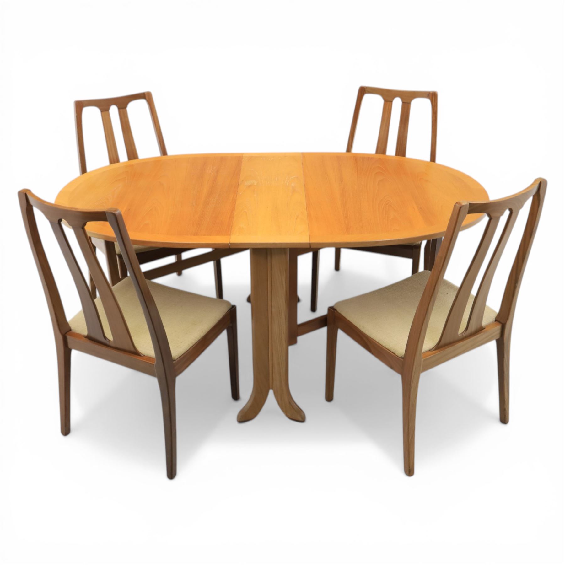 Nathan - teak drop leaf dining table and four Nathan dining chairs, the rectangular top with rounded corners fitted with twin hinged drop leaves and gate legs, extended to form an oval table 174cm in length, raised on square section supports united by stretchers, the chairs with teak frames and padded beige upholstered seat (H 96cm, W 48cm)
