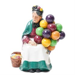 Five Royal Doulton figures comprising The Master HN2325 , Thanks Doc HN2731, signed,  Nanny HN2221, The Laird HN2361 and The Old Balloon Seller HN1315 