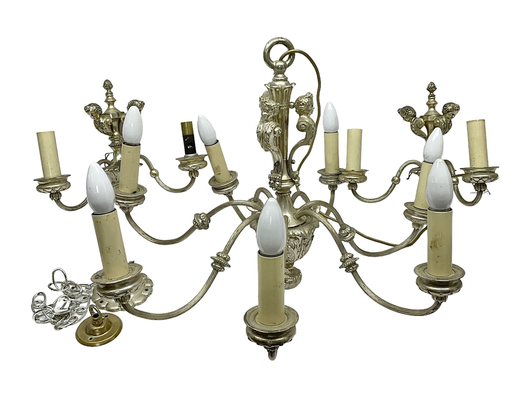 Siz branch silvered chandelier, decorated with acanthus leaves and putti, together with two matching three branch wall sconces, chandelier D65cm