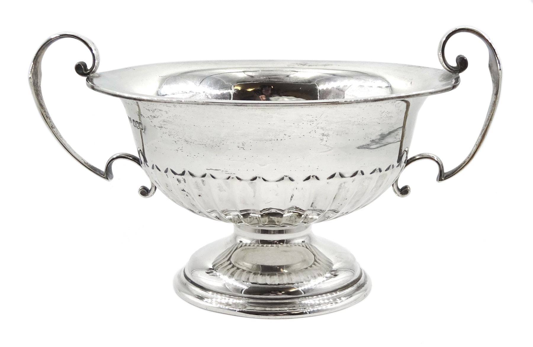 Silver twin handled pedestal bowl, with reeded lower body, by Walker