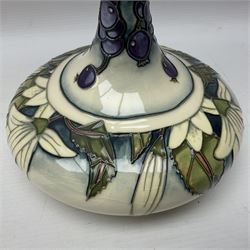 Moorcroft vase, of compressed form with a tall flared neck, decorated in the Juneberry pattern, circa 2000, H25cm