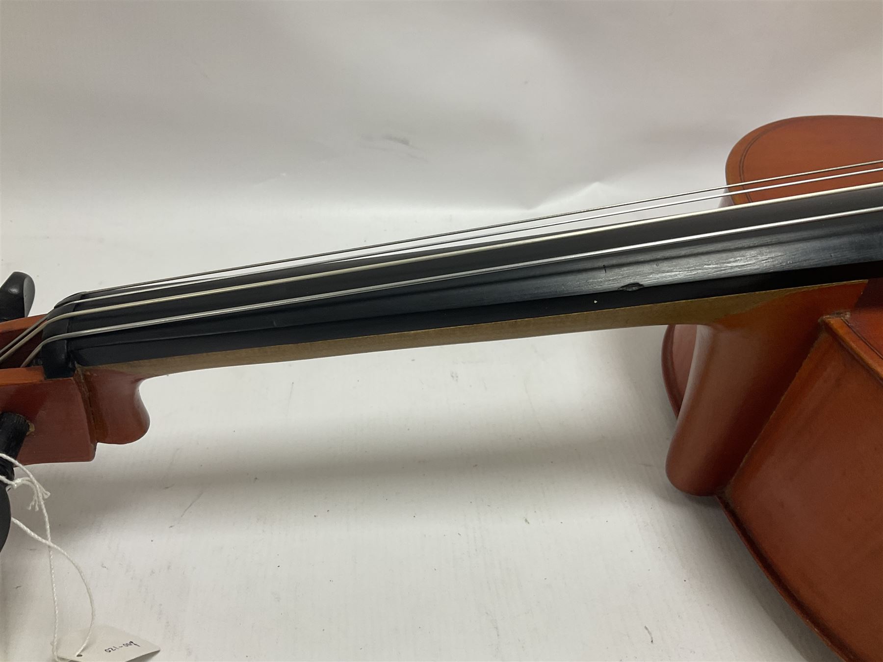 3/4 size cello with soft case, 69cm back length, 114cm full length, with bridge, ebonised tail piece and fingerboard.