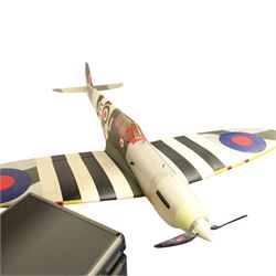 A collection of Remote control airplanes and helicopters; comprising four airplane built models, Walkera WK-2801 Pro transmitter boxed in a flight case, miscellaneous small RC helicopter parts and transmitters 