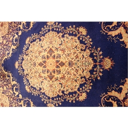  Large Grosvenor Seamless Wilton blue ground carpet, with central medallion, 455cm x 366cm  