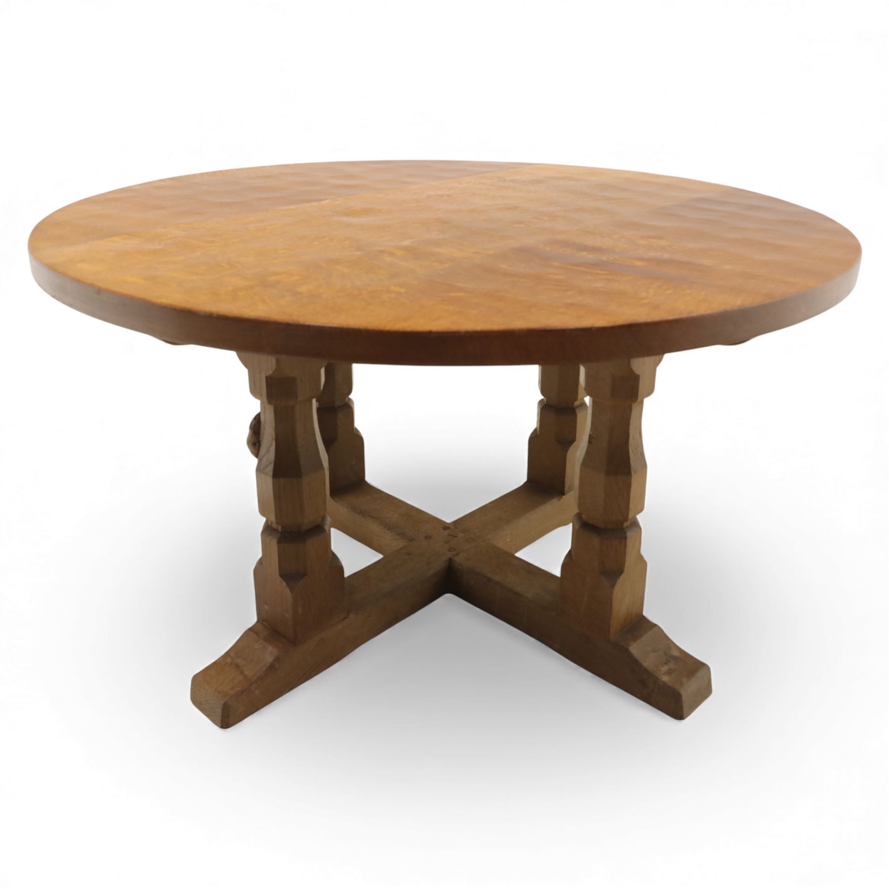 Mouseman - oak coffee table, the circular adzd top over four pillars united by stretchers, with signature mouse carving by Robert Thompson of Kilburn 