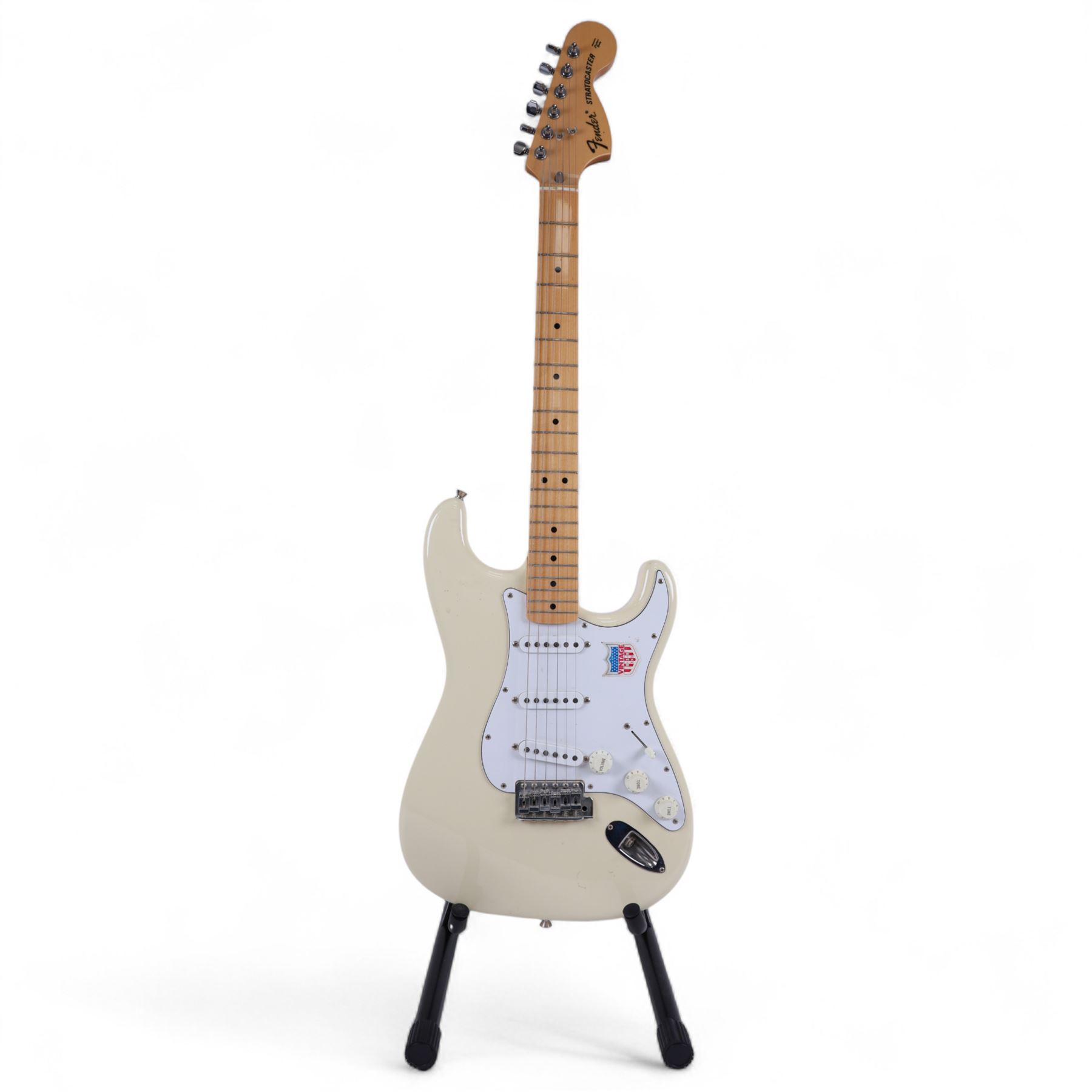Fender Stratocaster electric guitar, serial no. P093223 made in Japan c.1993, with cream body, white scratch plate, maple neck, three pickups, three control dials and five way selector switch, in a black Fender USA hardcase, guitar L99cm