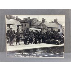 Set of four photographic prints entitled 'The European War 1914 - The Territorials Leave Pickering'; depicting soldiers on parade and marching through the streets of Pickering and ready to embark at the railway station 21 x 29cm; modern mahogany stained frames (4)