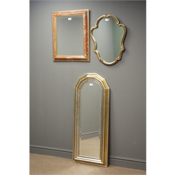  Gilt shaped framed wall mirror (60cm x 45cm), arched bevel edged rectangular gold and silver framed mirror and a square bevel edged mirror with red and floral painted frame  