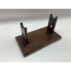 Early 19th century flintlock 16-bore overcoat/duelling pistol by William Bond Lombard Street London, the 23cm octagonal brown stub twist damascus barrel with small foresight, two barrel pins and ram rod under, inscribed Lombard Street London to the top and W. Bond to the action, full walnut stock with lightly engraved steel furniture, pineapple finial and escutcheon, half cock facility L39cm; loose mounted on later mahogany display stand with trade label