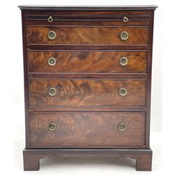 Small Georgian style mahogany bachelor's chest, the moulded rectangular top over slide and four graduating drawers with hardwood linings, circular brass plate and ring handles decorated with the Prince of Wales feathers, on bracket feet