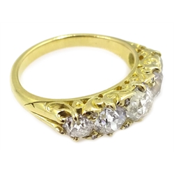  18ct gold (tested) five stone diamond ring, central diamond approx 0.9 carat  