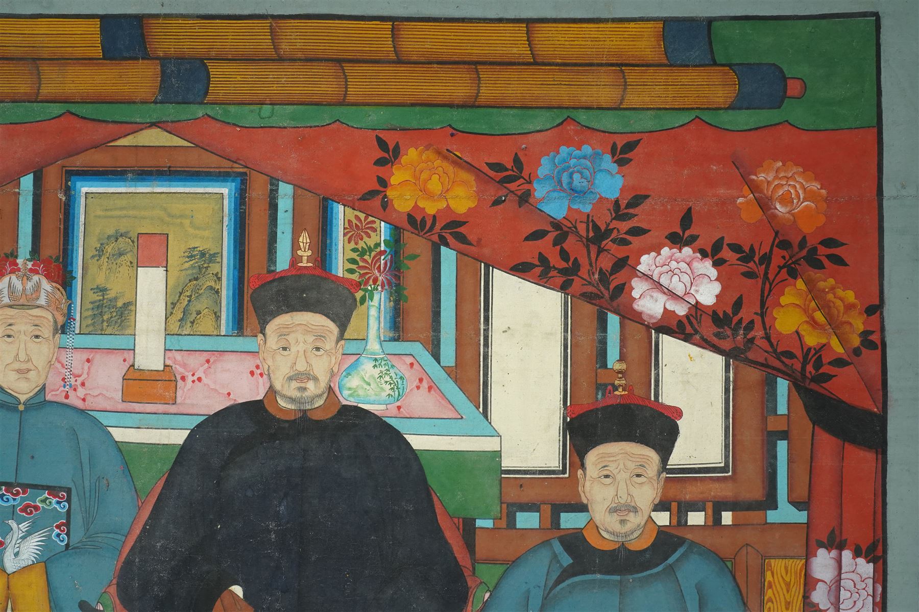 Large and impressive Chinese ancestral portrait, late Qing dynasty, gouache on stitched canvas with gilded highlights, showing thirty-eight sitters across four registers, the principal ancestors depicted before an altar table holding various ritual items, each in official dress and many wearing Golden Pheasant (Second-rank) and Silver Pheasant (Fifth-rank) Mandarin squares or 'buzi', overall 190cm x 131cm 