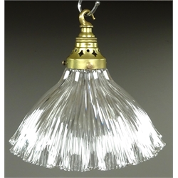  Set of six early 20th century Holophane hanging light fittings with reeded clear glass shades and pierced brass fittings, Pat. No.28498/15. Provenance Harome Methodist Chapel, D25cm (6)  