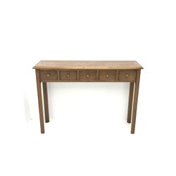 Contemporary oak, mahogany, and figured burr walnut narrow console table, moulded rectangular top with oak band and satinwood stringing, five cock beeded short drawers with turned handles, moulded and canted square supports 